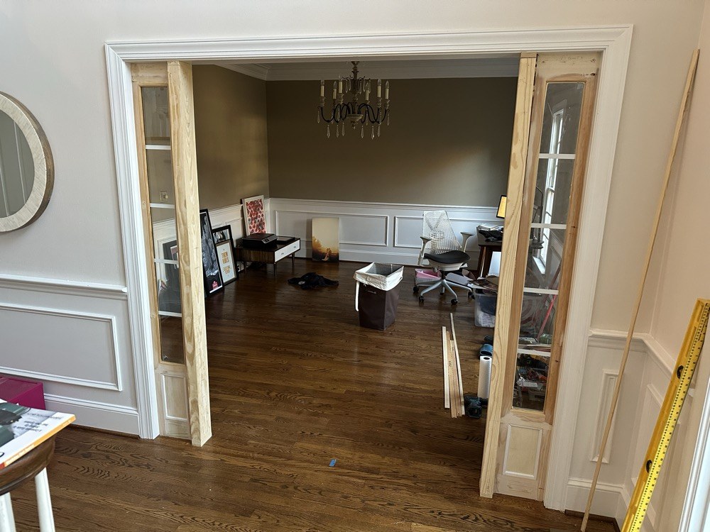 Dining room opening with sidelights being fitted